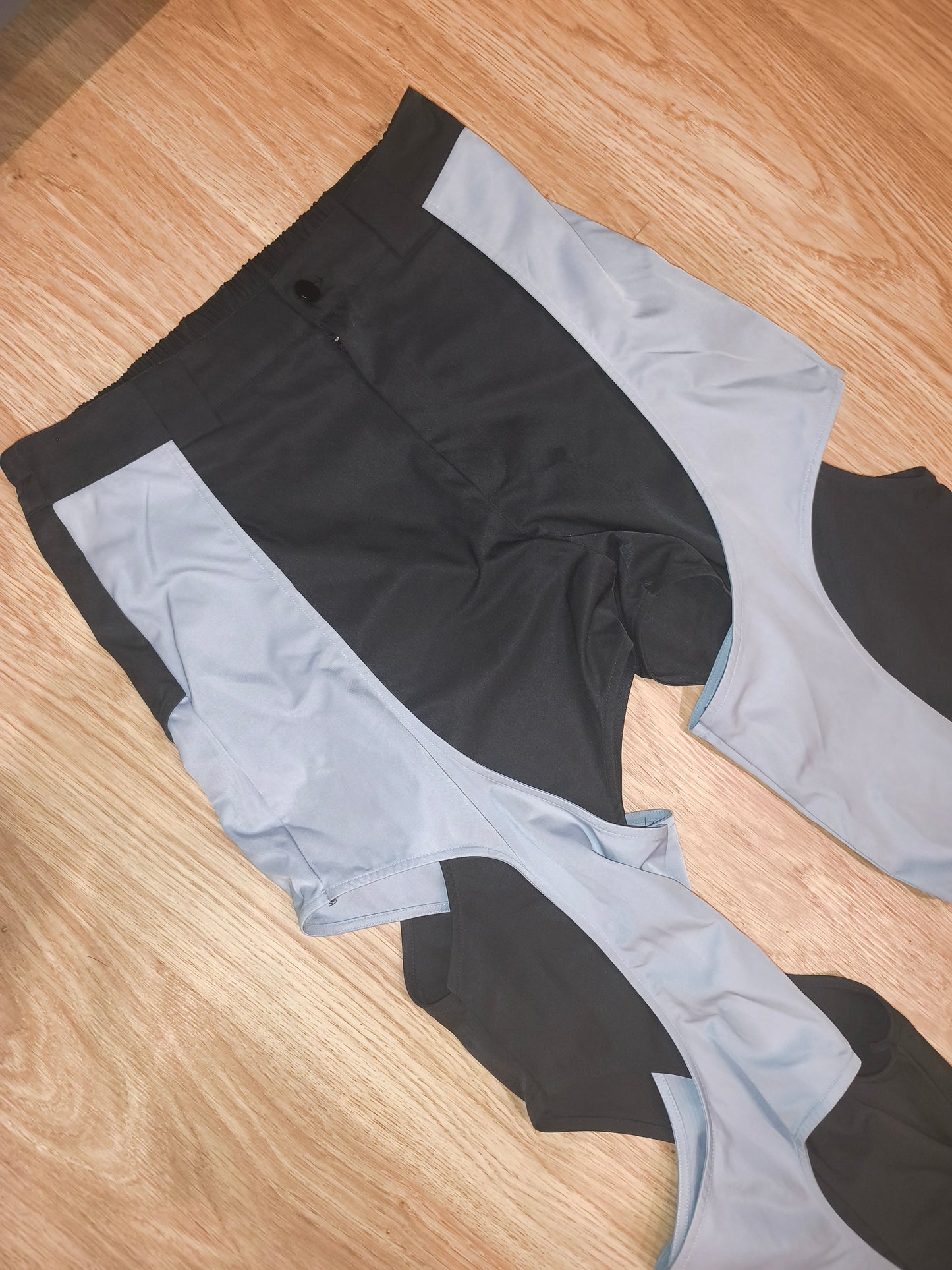 Unbranded Two-Tone Avant-Garde Curved Cutout Pants – Black / Grey – Size M