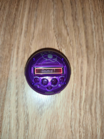 Vintage Radica 20Q Handheld Electronic Game | Translucent Purple Retro AI Thinking Ball