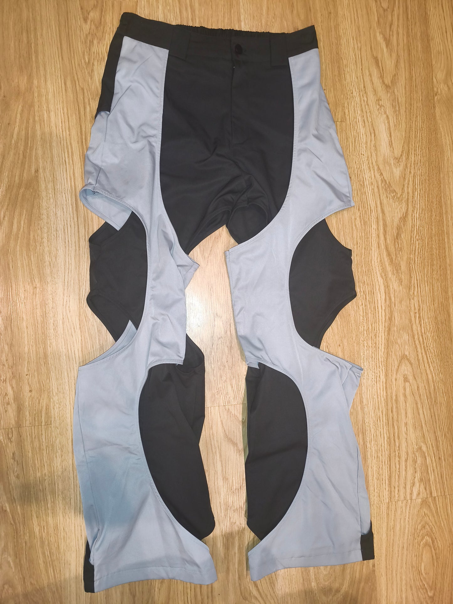 Unbranded Two-Tone Avant-Garde Curved Cutout Pants – Black / Grey – Size M