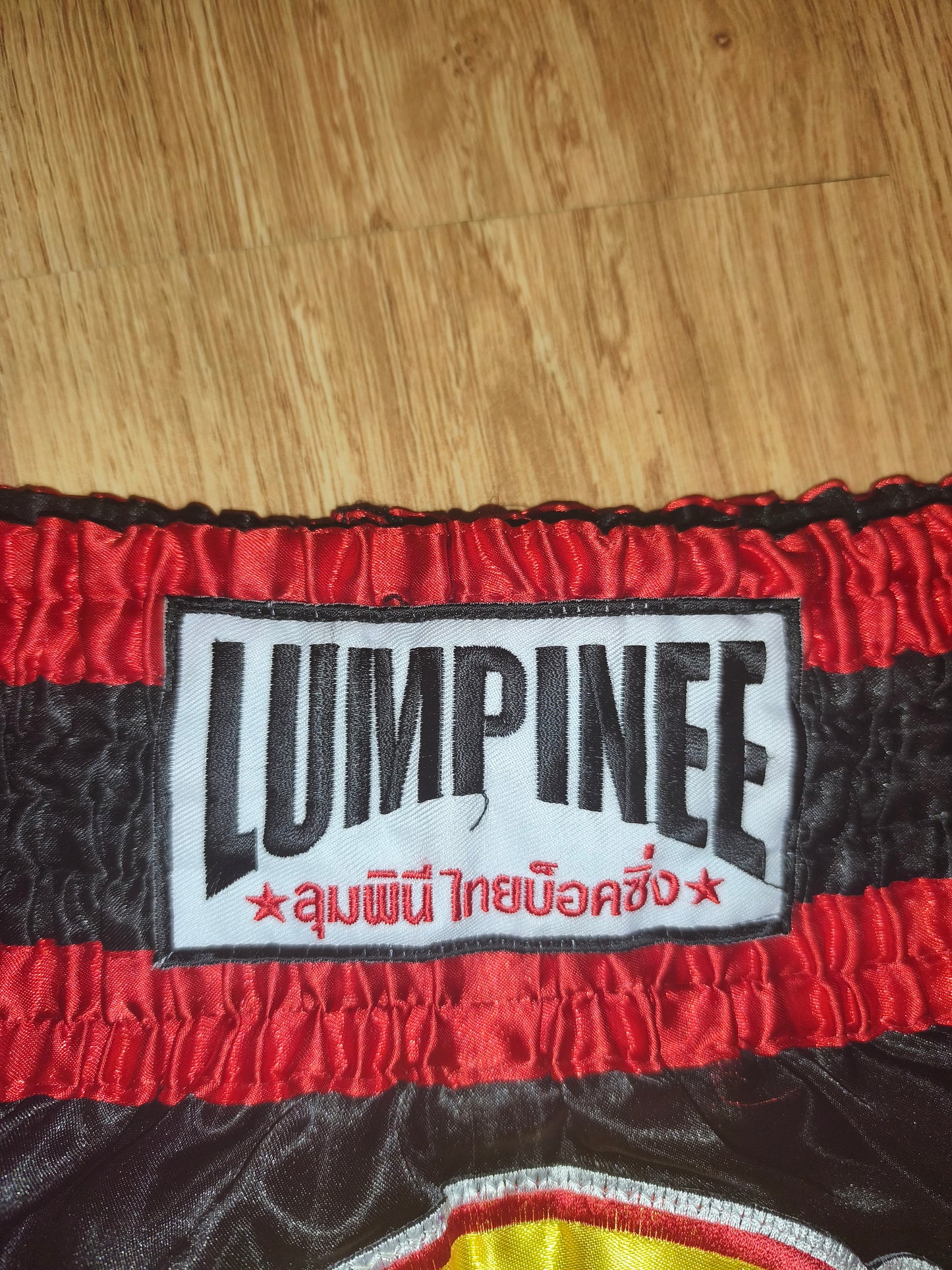 Authentic Lumpinee Muay Thai Shorts Black & Red Bull Patch – Size L