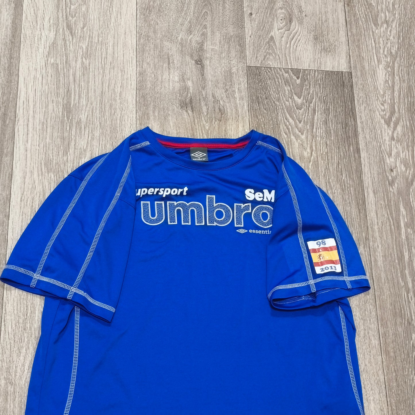 Umbro Supersport SeMi Essentials Blue Short Sleeve T-Shirt Graphic Spain Patch