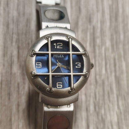 PELEX Quartz Blue Dial Stainless Steel Back Water Resistant Watch Cage Detail