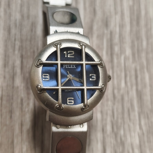 PELEX Quartz Blue Dial Stainless Steel Back Water Resistant Watch Cage Detail