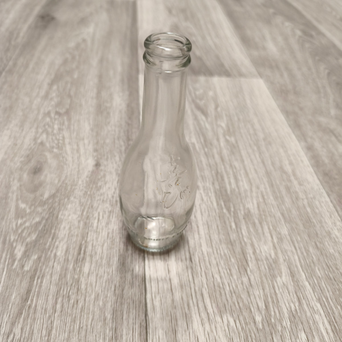 Vintage Clear Glass Embossed Bottle The Spirit Enhancer Collectible Display Glass