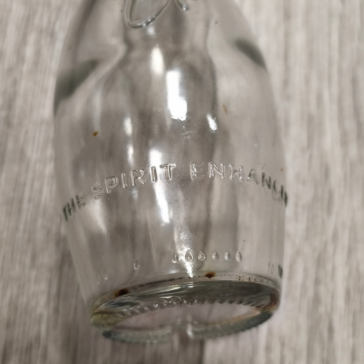 Vintage Clear Glass Embossed Bottle The Spirit Enhancer Collectible Display Glass